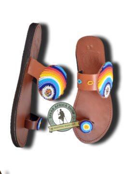 Koki Maasai Sandals with intricate multicolored beadwork and brown leather, available at Spear Africa Shop.